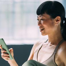 A woman checking her smartphone