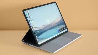 Microsoft Surface Laptop Studio on a beige background