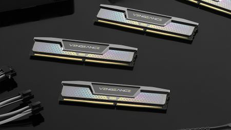 A promotional image showing multiple Corsair Vengeance CUDIMM memory sticks on a desk