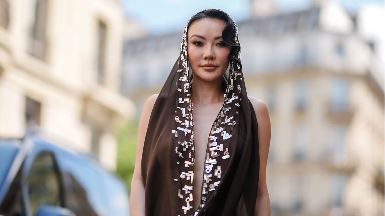 best brown mascaras Jessica Wang sporting a brown headscarf and smoky eye getty images 2159586691