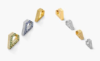 Seven pieces of gold and diamond heart shaped bands. 