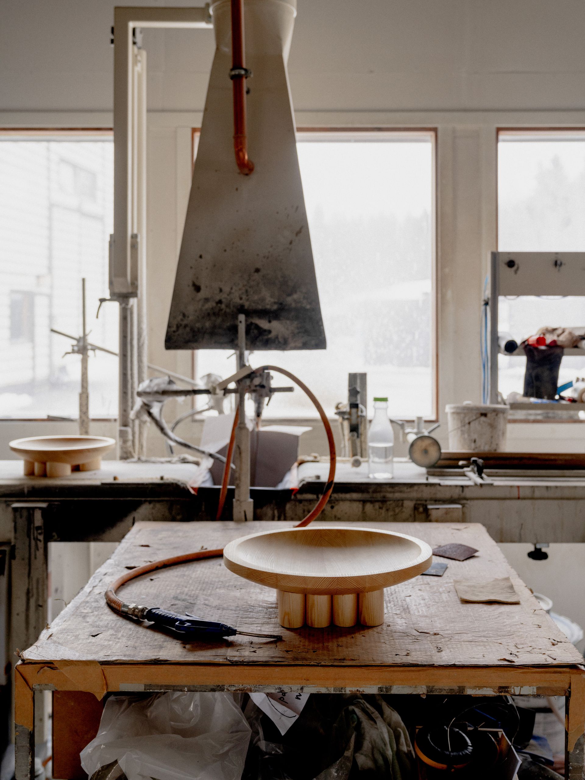 pine wood bowl on factory table