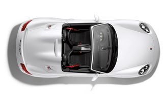 Looking down onto a white Boxter Spyder with black interior