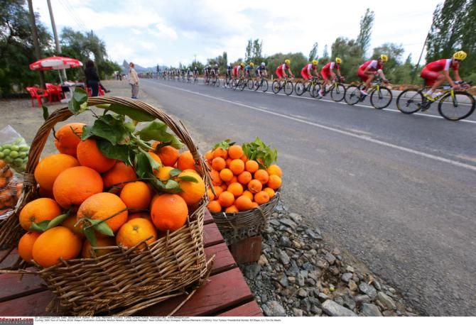A few Cofidis riders eye off a fruit snack