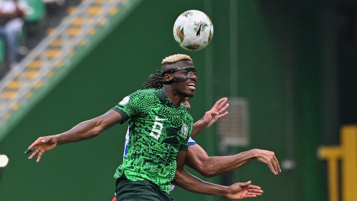 Nigeria&#039;s forward #9 Victor Osimhen heads the ball ahead of the Nigeria vs South Africa ACFON semi-final.