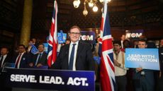 Tom Tugendhat is flanked by supporters at a press conference formally announcing his bid for Conservative Party leadership on 3 September