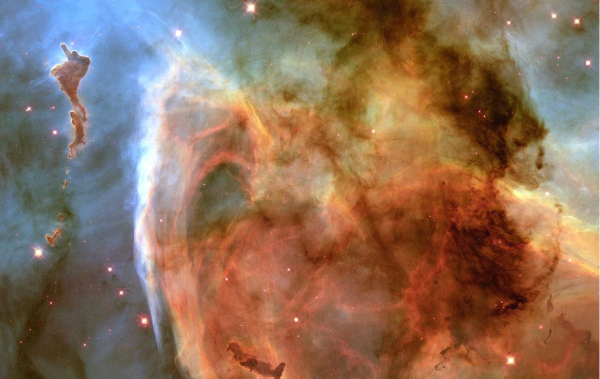 The pillar in the upper left corner of the Carina Nebula (shown here) is sometimes referred to as the finger of God. The montage was snapped by NASA&#039;s Hubble Space telescope in April 1999.