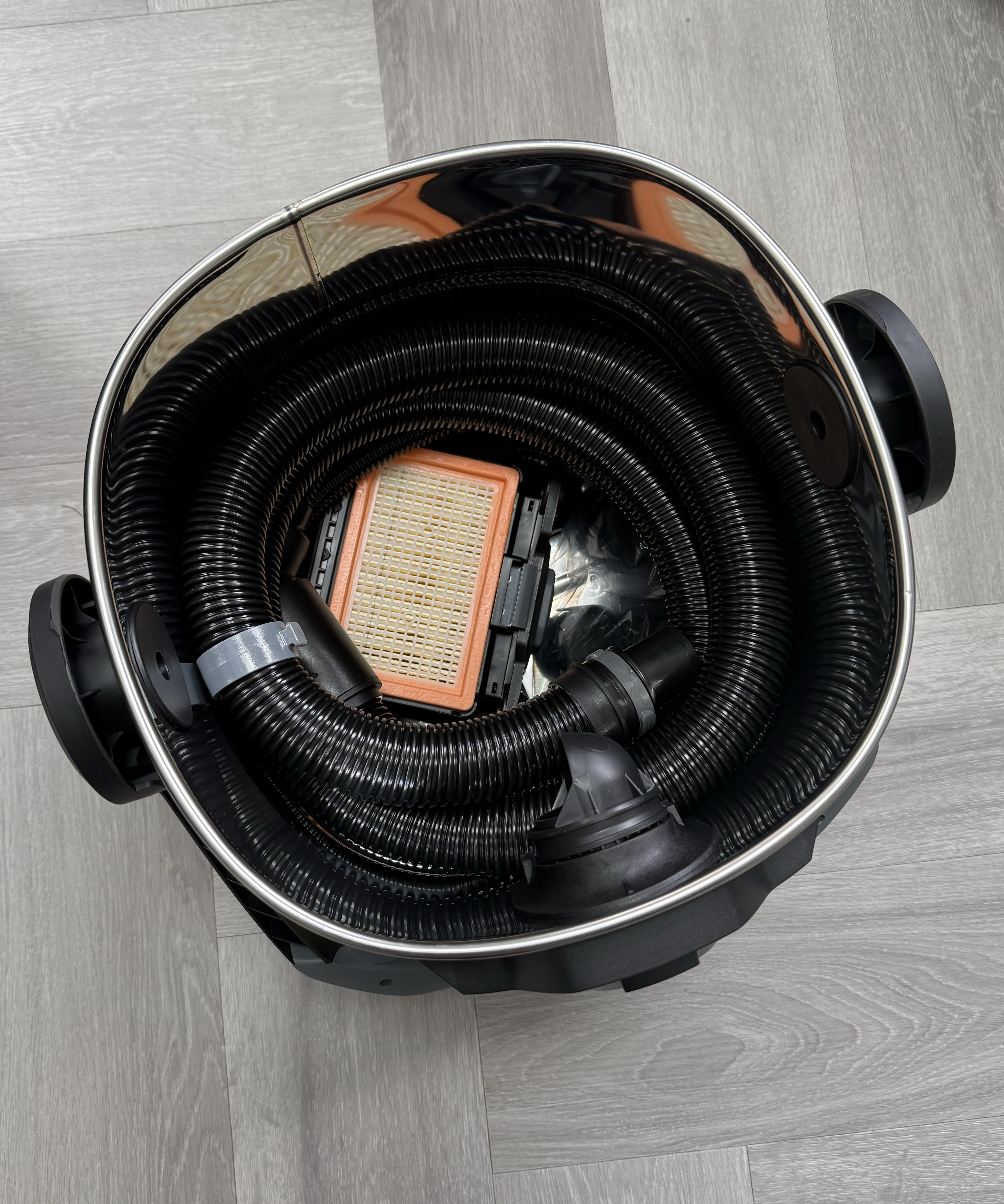 K&amp;auml;rcher WD 6 hose and filter stored inside the stainless steel container before assembly