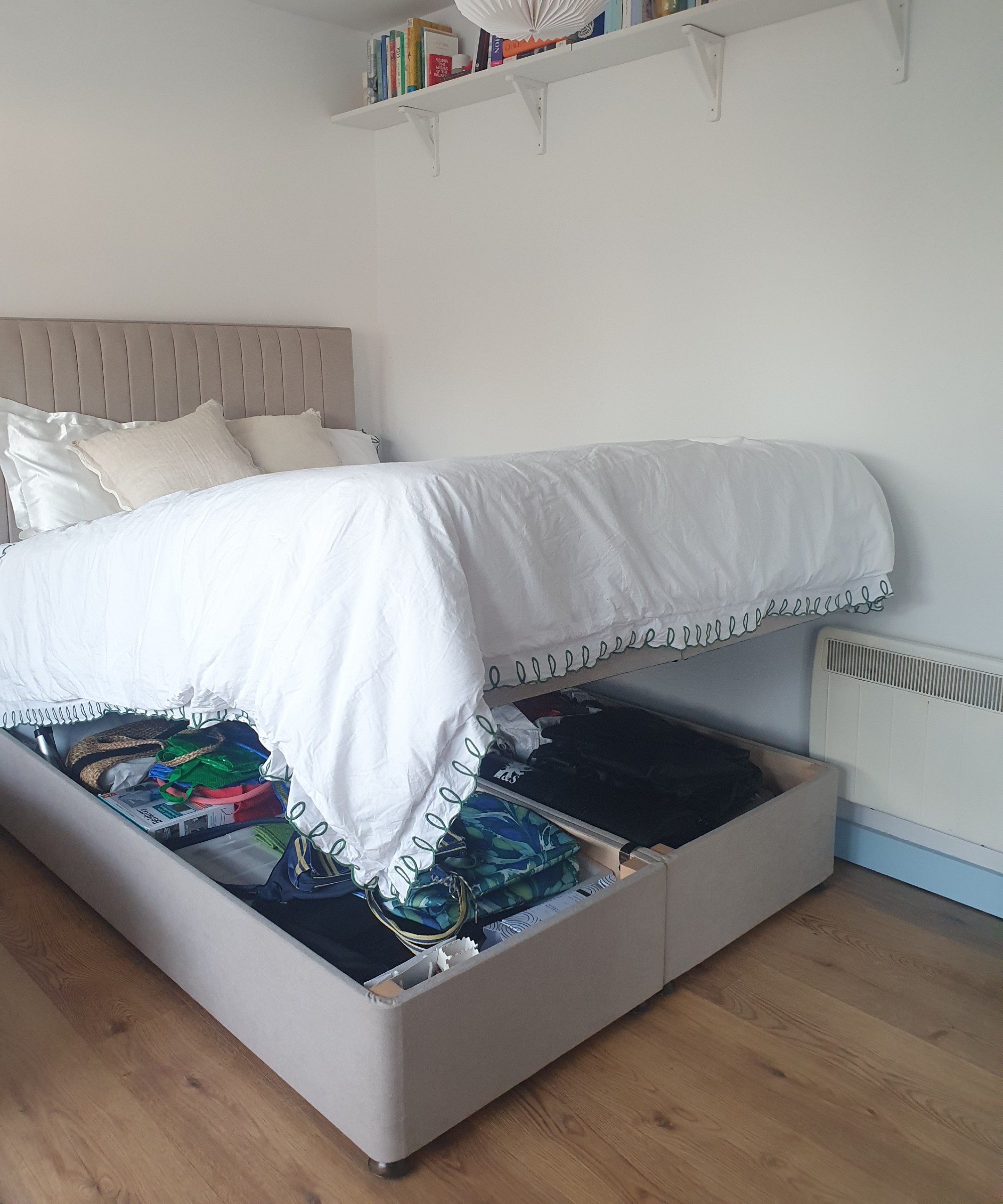 My Simba Camden electric ottoman bed open with all my stored items inside