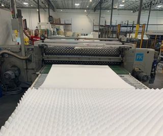 Watching an egg crate mattress topper get made at the 3Z Brands mattress factory.