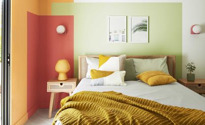 a bedroom with colour blocked walls