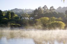 Lake-House-accross-the-misty-lake.jpg