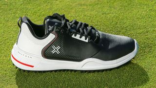The side profile of the Payntr X003F golf shoe in black and white