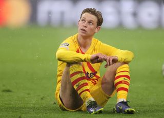 Frenkie de Jong of Barcelona looks dejected after the second goal during the UEFA Champions League group E match between FC Bayern München and FC Barcelona at Football Arena Munich on December 08, 2021 in Munich, Germany