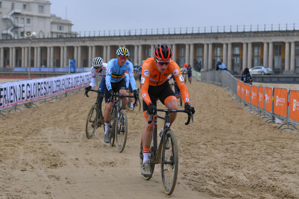 OOSTENDE BELGIUM JANUARY 30 Ryan Kamp of The Netherlands Timo Kielich of Belgium and Ben Turner of The United Kingdom Oostende Beach Landscape during the 72nd UCI CycloCross World Championships Oostende 2021 Men U23 UCICX CXWorldCup Ostend2021 CX on January 30 2021 in Oostende Belgium Photo by Luc ClaessenGetty Images