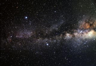 In this image we can see the asterism of the Summer Triangle a giant triangle in the sky composed of the three bright stars Vega (top left), Altair (lower middle) and Deneb (far left).