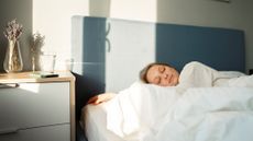 sleep expert approved Woman Sleeping in bed