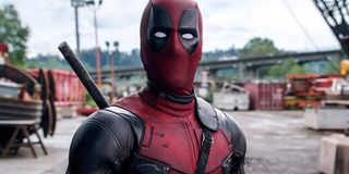 Ryan Reynolds as Deadpool in costume looking surprised