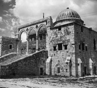 The side entrance to the Dome of the Rock in Jerusalem, as it stood around 1950.
