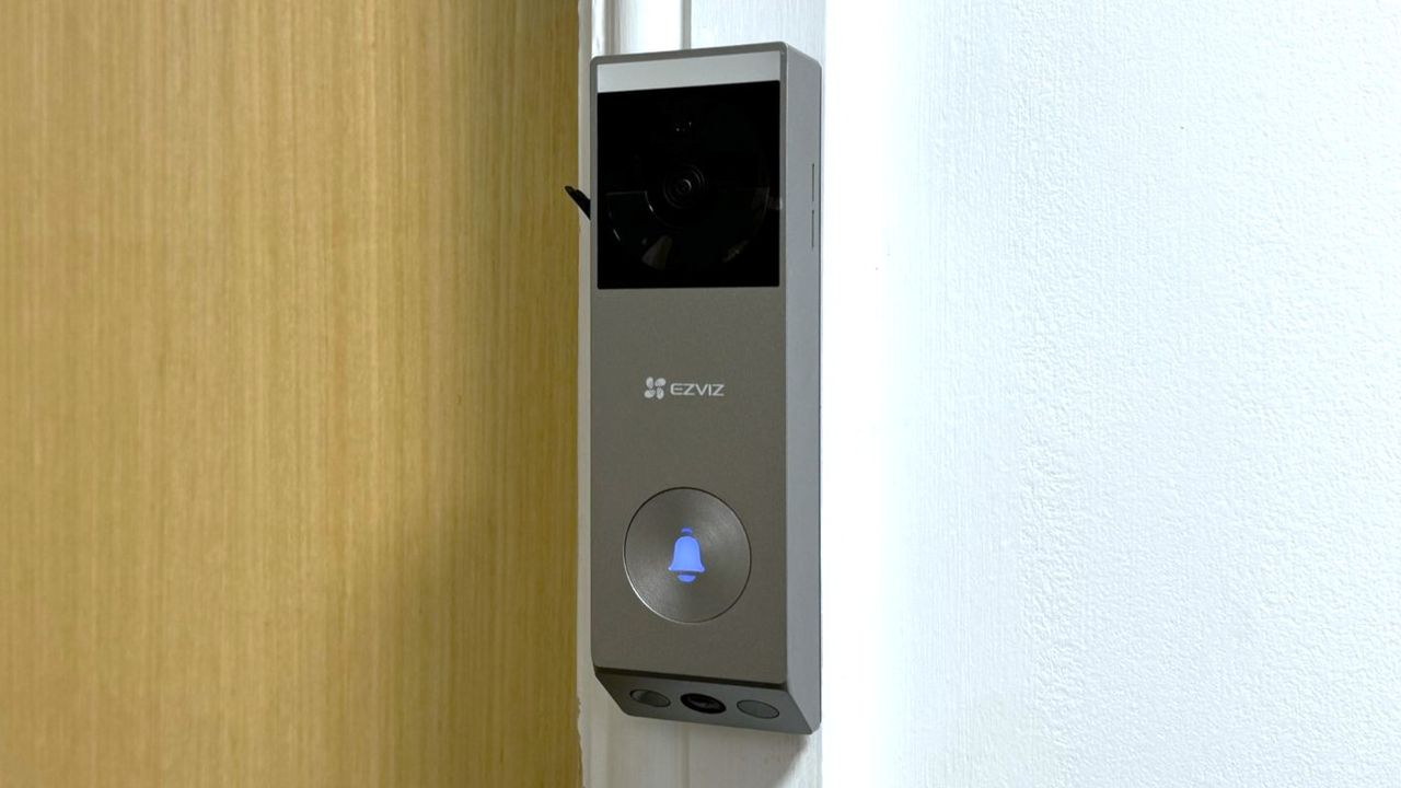EZViz EP3x Pro video doorbell mounted beside door