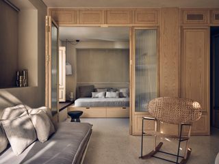 Modern hotel suite with wooden decor