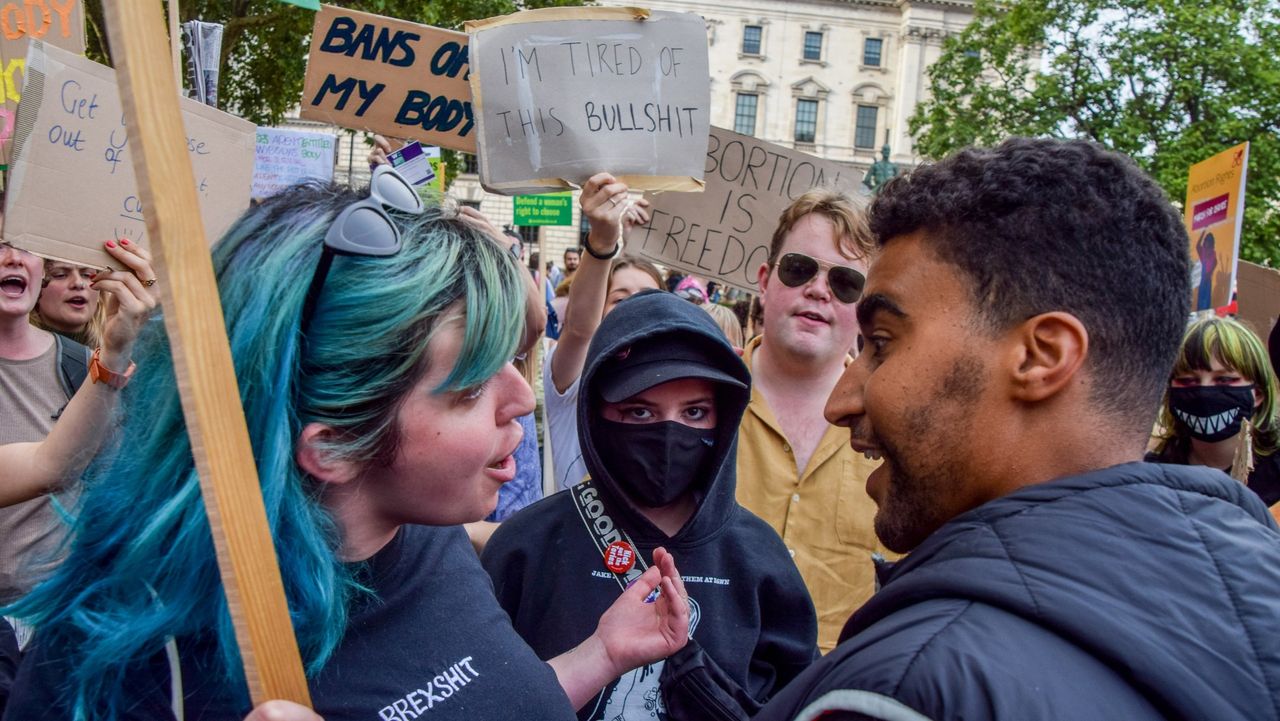 Pro-choice campaigners confront an anti-abortion protester in London in September 2022