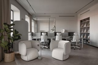 Kyiv office by Bogdanova Bureau with neutral grey furniture
