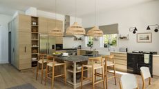 A bright wooden kitchen with marble island and wooden chairs, white walls, rattan hanging pendant lamps, a silver fridge freezer and wooden flooring