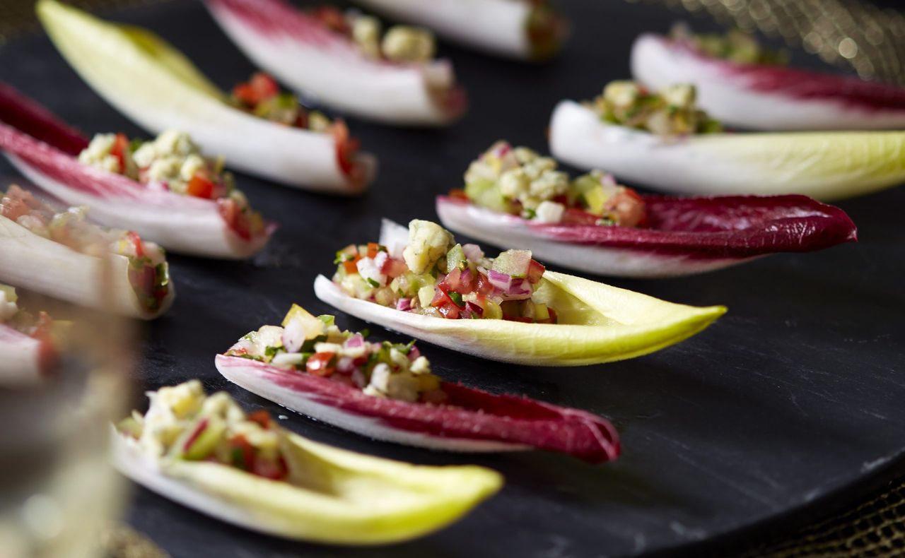 Chicory lead with tomato salsa and blue cheese canape