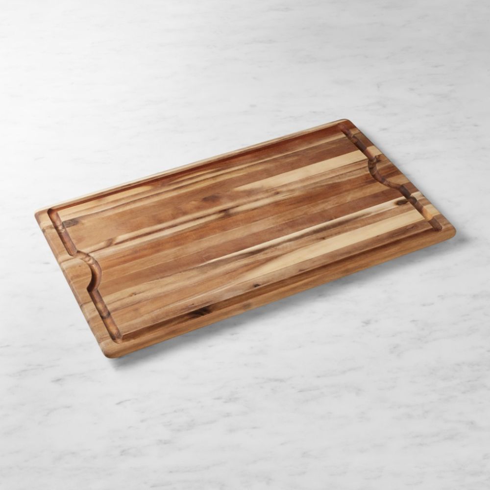Teak wood meat cutting board with indented edges
