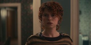 I'm Thinking of Ending Things Jessie Buckley staring at something oddly