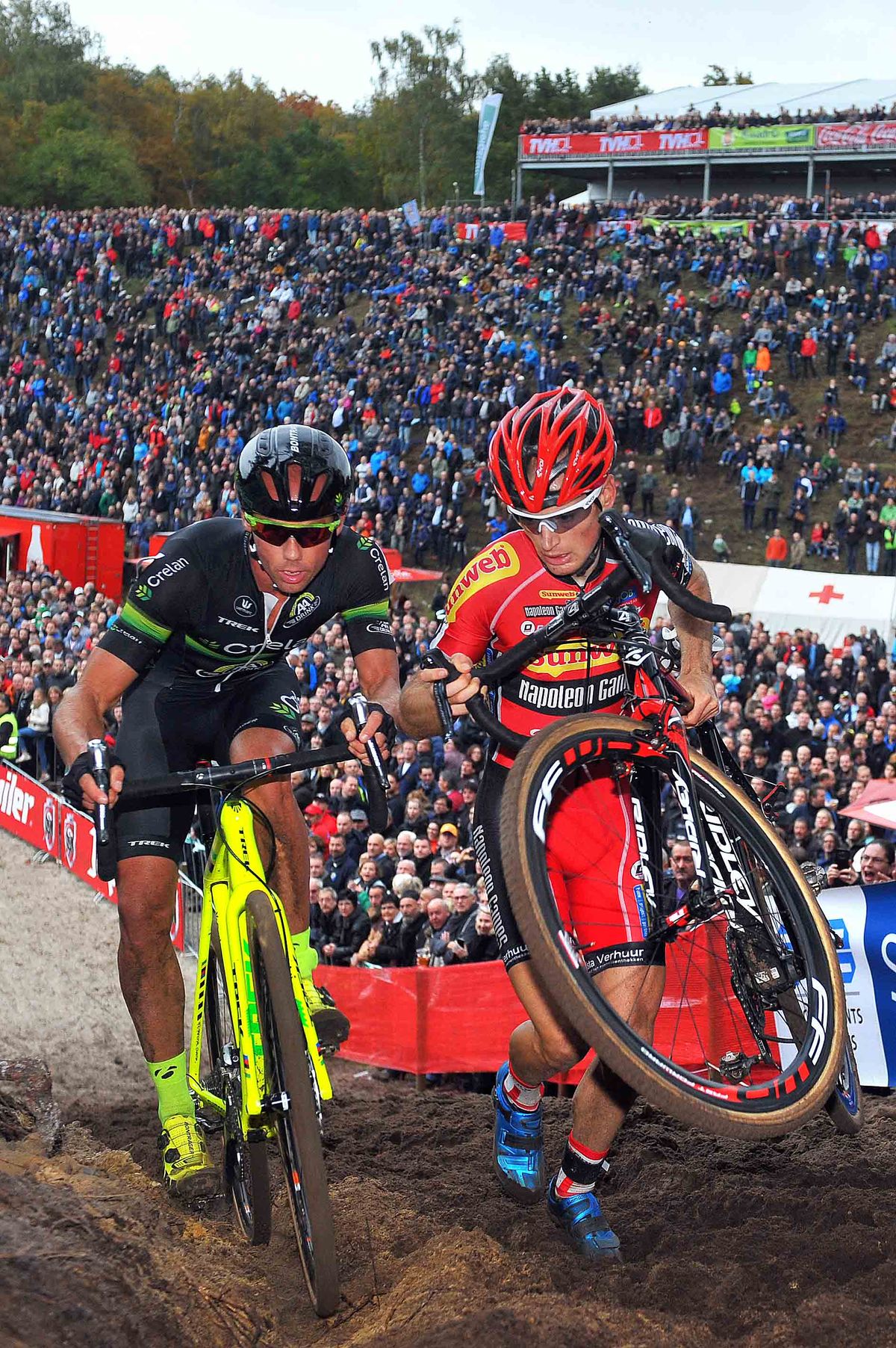 Sven Nys (Crelan-Euphony) and Kevin Pauwels (Sunweb - Napoleon Games) go shoulder to shoulder up the sandy ramp