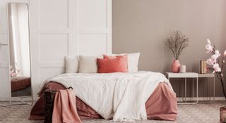 White and peach bedroom setting