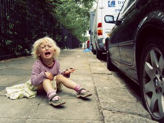 child tantrum on pavement