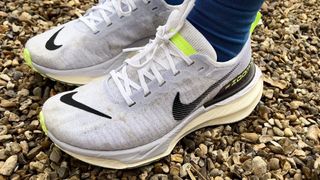 Nike Invincible 3 running shoes on a gravel path