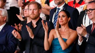 German Federal President Frank-Walter Steinmeier, Prince Harry, Duke of Sussex, Meghan, Duchess of Sussex and Dominic Reid during the closing ceremony of the Invictus Games Düsseldorf 2023