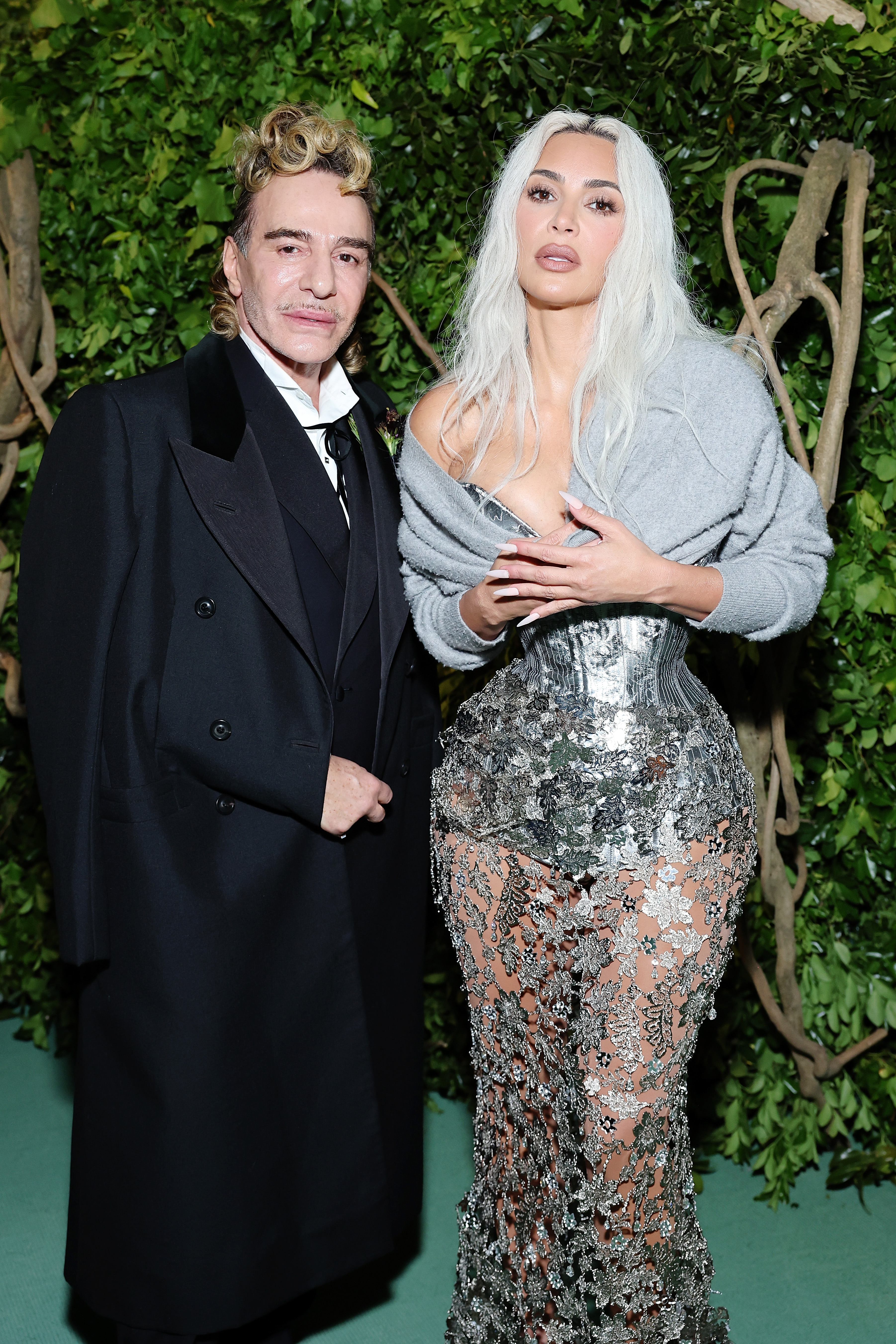 NEW YORK, NEW YORK - MAY 06: (L-R) John Galliano and Kim Kardashian attend The 2024 Met Gala Celebrating "Sleeping Beauties: Reawakening Fashion" at The Metropolitan Museum of Art on May 06, 2024 in New York City. (Photo by Cindy Ord/MG24/Getty Images for The Met Museum/Vogue)
