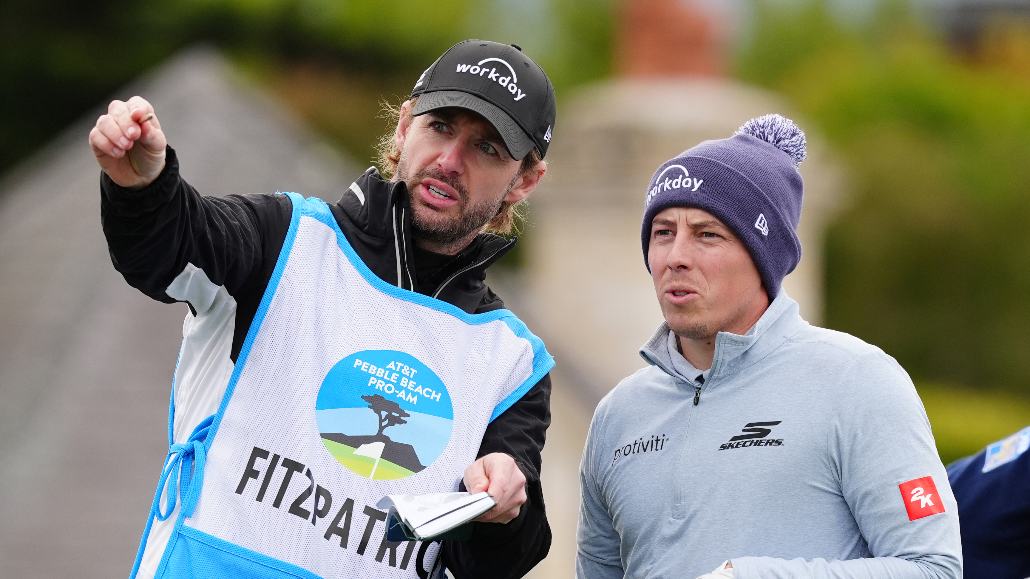 Matt Fitzpatrick (right) and his caddie Daniel Parratt discuss a shot during the 2025 AT&amp;T Pebble Beach Pro-Am
