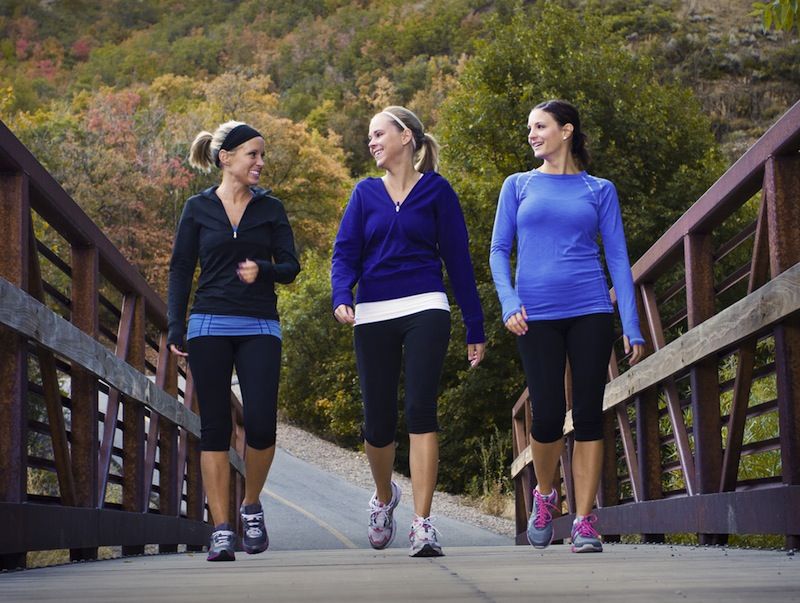 Three women walk together