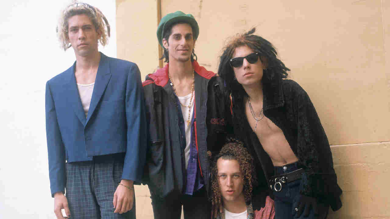 Jane&amp;rsquo;s Addiction posing for a photograph in 1990