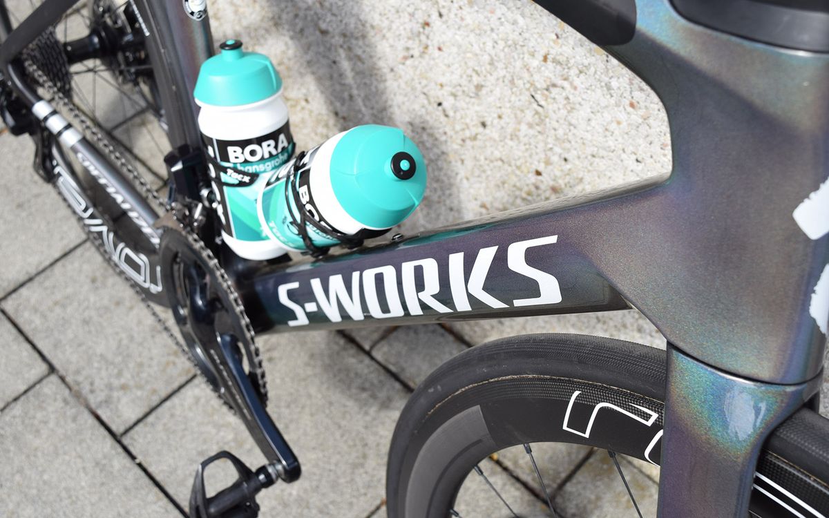 Specialized's pro riders use white decals for maximum brand exposure on the road