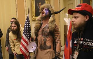 Protesters interact with Capitol Police inside the U.S. Capitol Building on January 06, 2021 in Washington, DC.