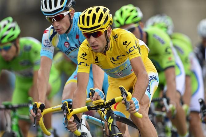 Vincenzo Nibali (Astana) races into Paris in yellow