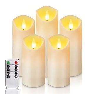 Five plastic LED pillar candles with a small remote control