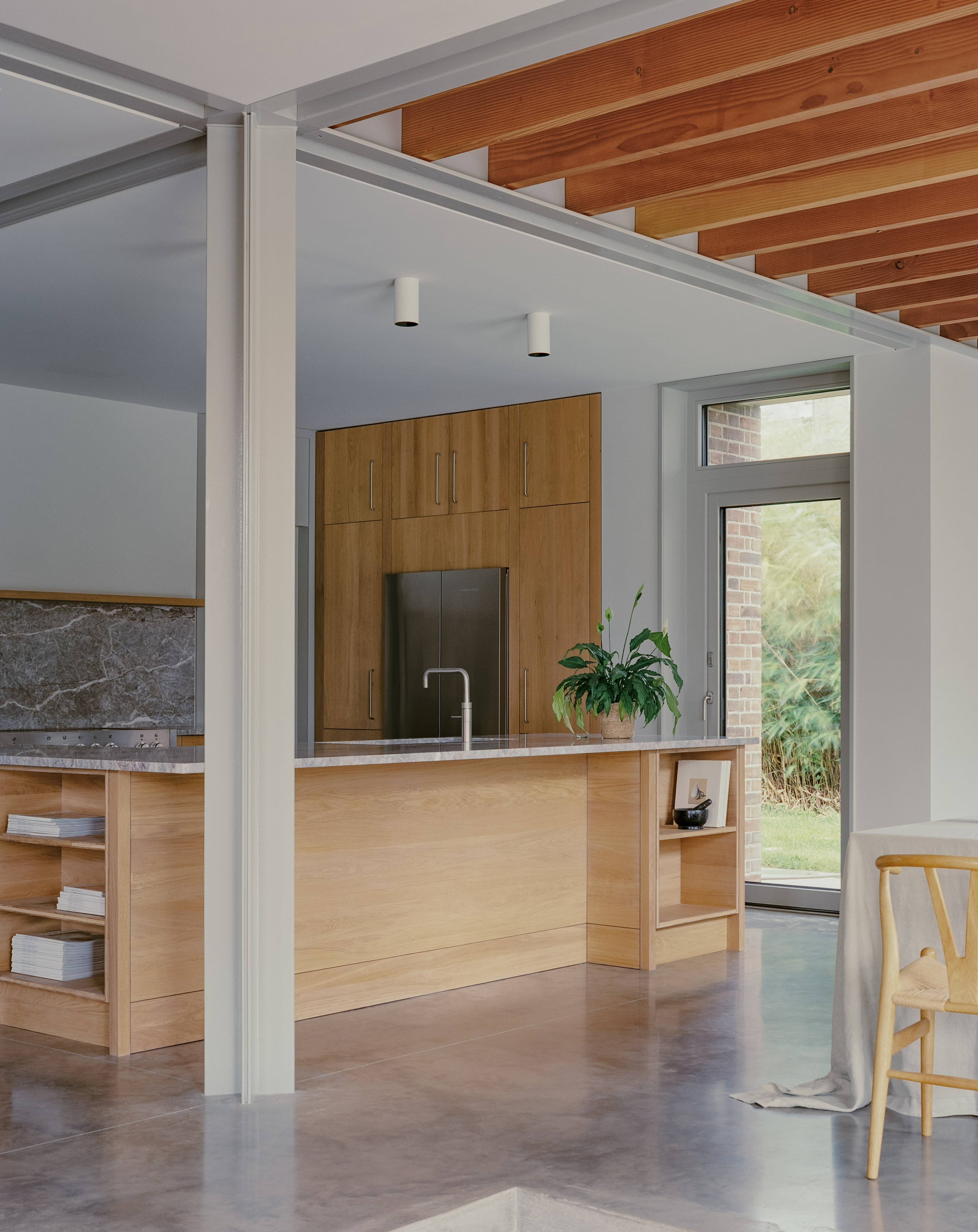 Another view of the marble and timber kitchen