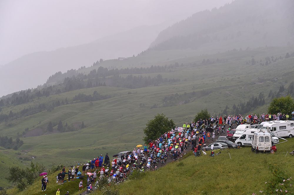 Fog and rain shroud the final climb during stage 20 at the Tour de France