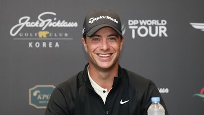 Guido Migliozzi smiles during a press conference before the 2024 Genesis Championship in Korea