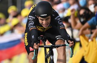 TOPSHOT Team Jumbo rider Belgiums Wout van Aert crosses the finish line at the end of the 20th stage of the 107th edition of the Tour de France cycling race a time trial of 36 km between Lure and La Planche des Belles Filles on September 19 2020 Photo by Marco BERTORELLO POOL AFP Photo by MARCO BERTORELLOPOOLAFP via Getty Images