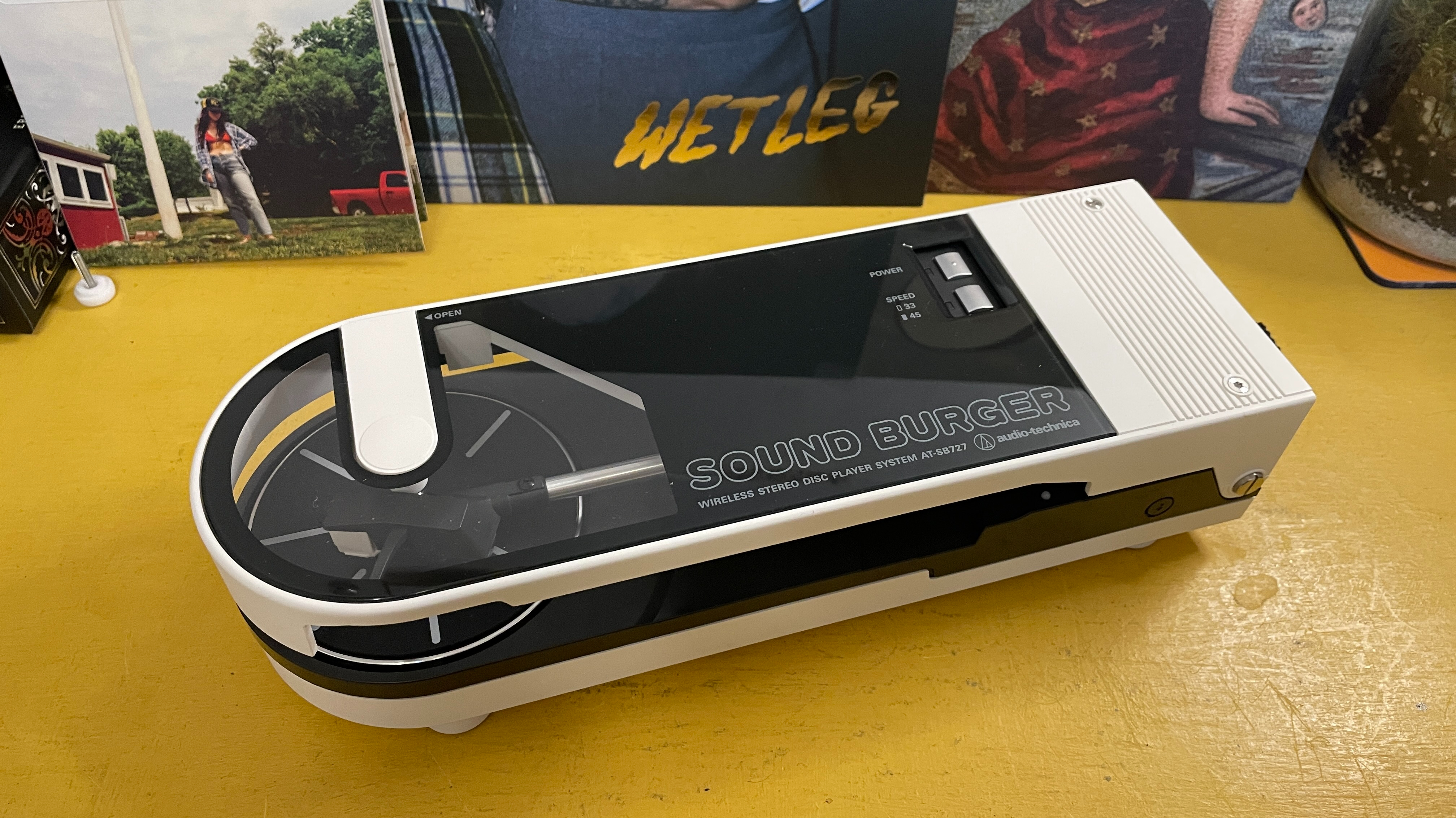 Audio Technica Sound Burger turntable on yellow desk