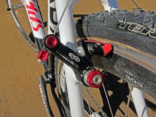 Specialized Roval carbon-specific pads (made by SwissStop) are fitted to Avid Shorty Ultimate cantilevers. Note the road pad holders instead of the stock units to better fit with the extra-wide Zipp rims